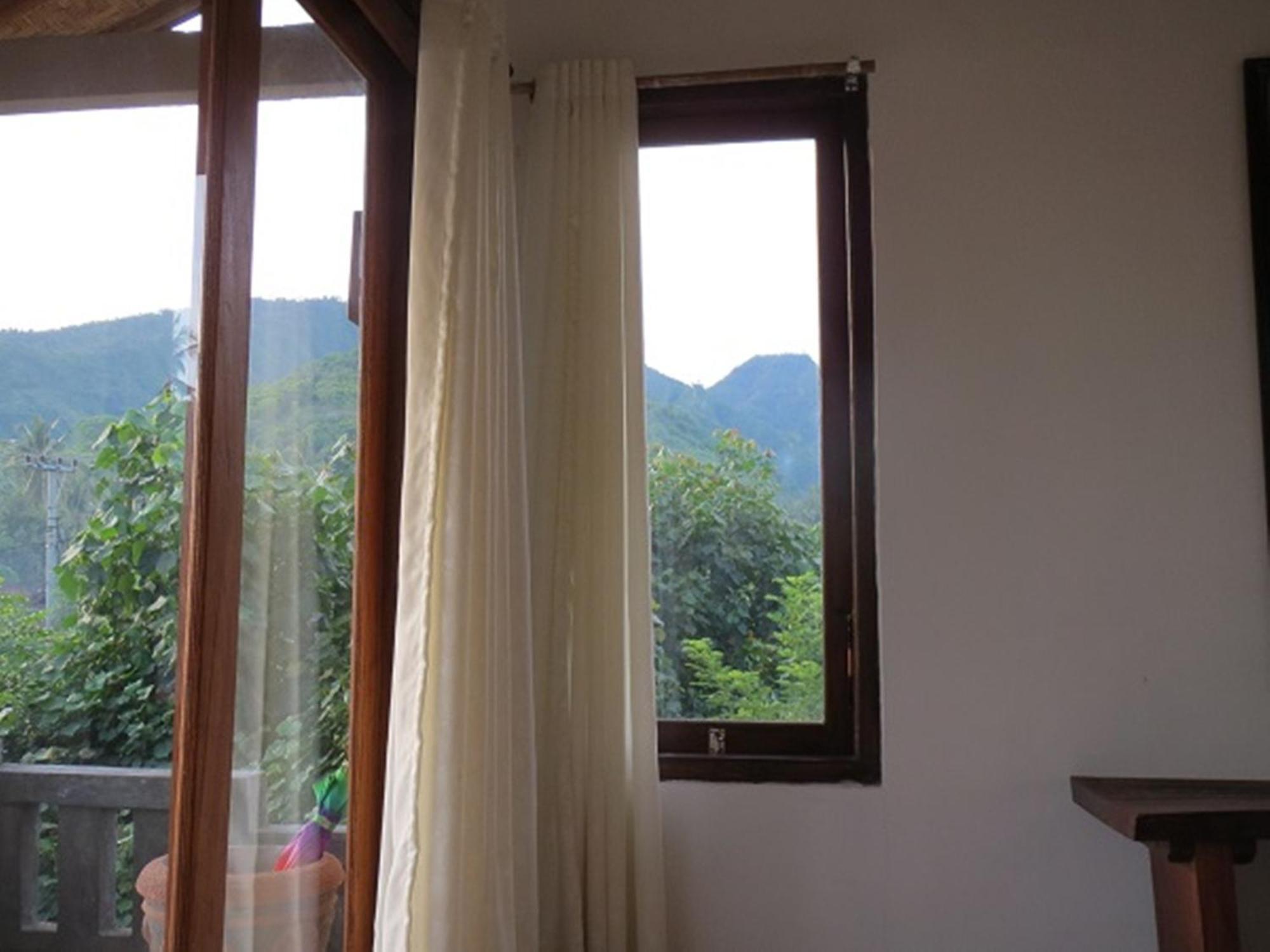 Bali Sari Homestay Amed Rum bild