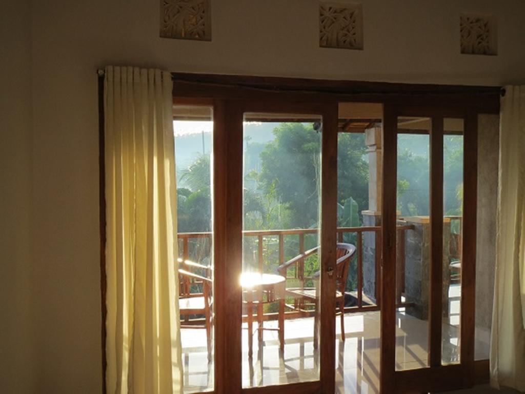 Bali Sari Homestay Amed Rum bild